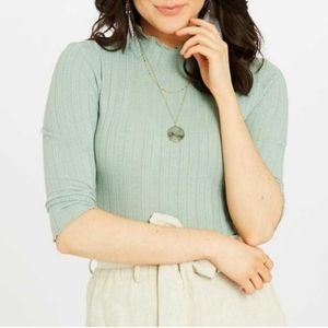 Mint green bodysuit from Altar'd state